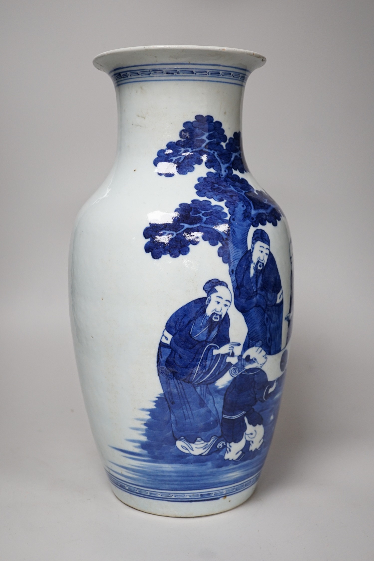 A large Chinese blue and white export vase, decorated with sages and attendants reviewing a scroll (a.f.), 37cms high